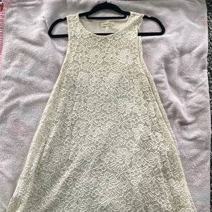 Off-white, high-neck, floral, short babydoll dress. Great for interviews/formals